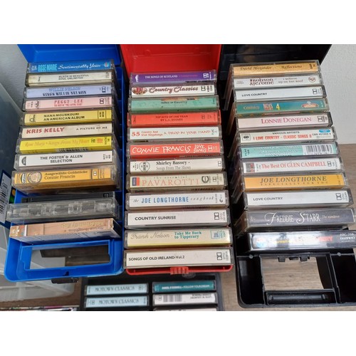 874 - A large collection of compact cassettes to include Chuck Berry, Glen Campbell, Tom Jones, Roy Orbiso... 