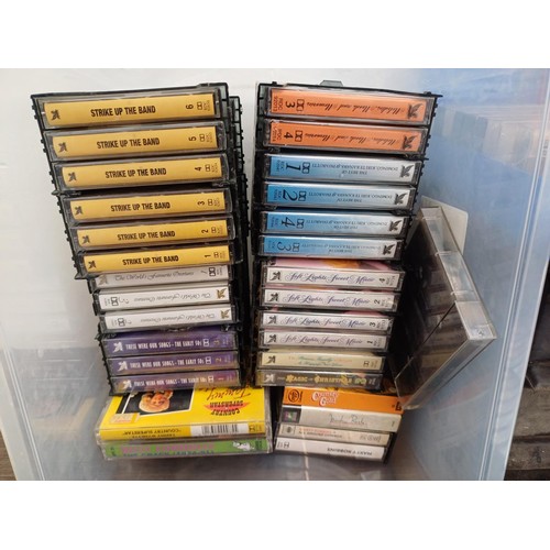 874 - A large collection of compact cassettes to include Chuck Berry, Glen Campbell, Tom Jones, Roy Orbiso... 