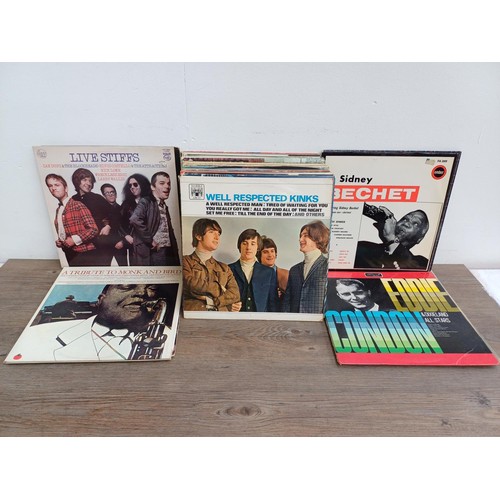 878 - A collection of LP vinyl records to include Elvis Costello, The Who, Rick Springfield, The Strawbs, ... 