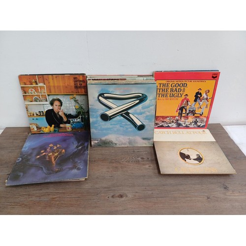 878 - A collection of LP vinyl records to include Elvis Costello, The Who, Rick Springfield, The Strawbs, ... 