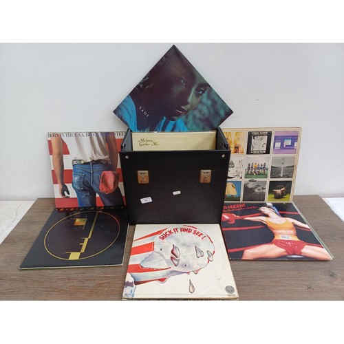 882 - A record case containing vinyl records to include Bauhaus '1979-1983' (BEGA64 - 1985 - limited editi... 