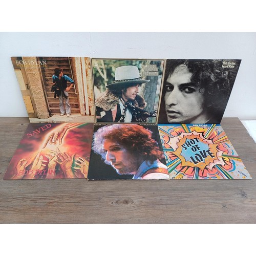 895 - Six Bob Dylan LP vinyl records, 'Street Legal', 'Desire', 'Hard rain', 'Saved', 'At Bukokan' (with i... 