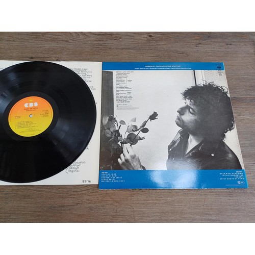 895 - Six Bob Dylan LP vinyl records, 'Street Legal', 'Desire', 'Hard rain', 'Saved', 'At Bukokan' (with i... 