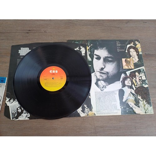 895 - Six Bob Dylan LP vinyl records, 'Street Legal', 'Desire', 'Hard rain', 'Saved', 'At Bukokan' (with i... 