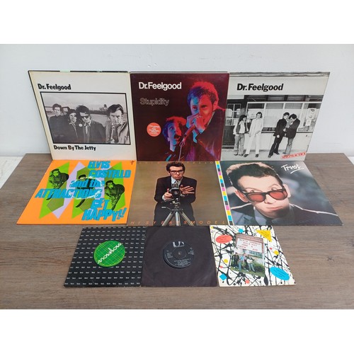 902 - A collection of vinyl records by Dr. Feelgood and Elvis Costello & The Attractions to include 'Malpr... 