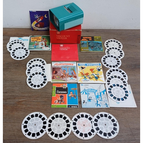 605 - A boxed vintage Paterson Viscount slide viewer with instructions and a collection of View-Master ste... 