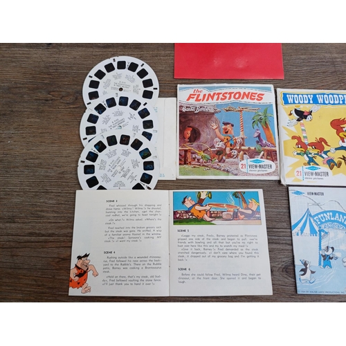605 - A boxed vintage Paterson Viscount slide viewer with instructions and a collection of View-Master ste... 
