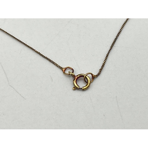 2037 - Two pieces of stamped 9ct gold jewellery, one diamond pendant necklace and one pendant - approx. gro... 