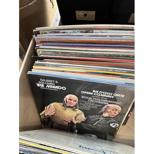 1060 - Three boxes containing vinyl records to include Motown Chartbuster no.5, The Dave Brubeck Quartet et... 