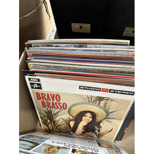 1060 - Three boxes containing vinyl records to include Motown Chartbuster no.5, The Dave Brubeck Quartet et... 