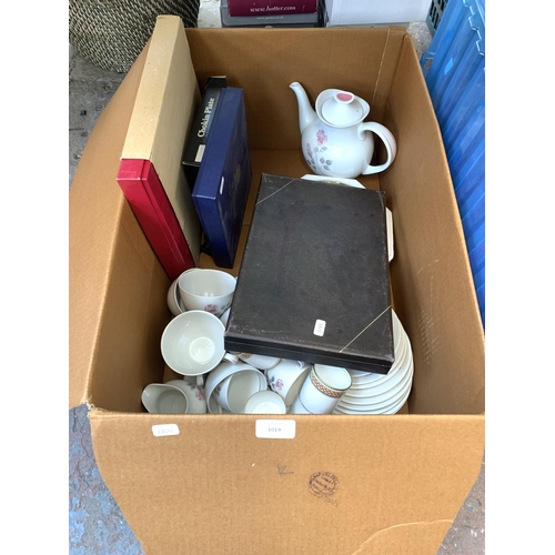 1019 - A box containing Royal Doulton ceramics, Royal Worcester collectors plates, cutlery canteen etc.