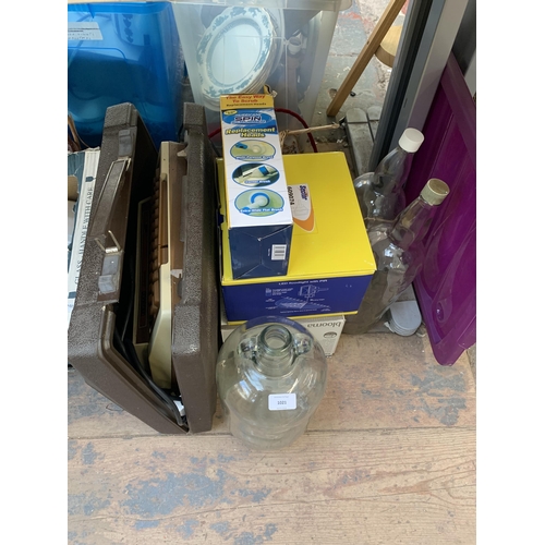 1021 - A quantity of items to include demijohns, Hurricane spin scrubber, George Foreman grill, electric ty... 