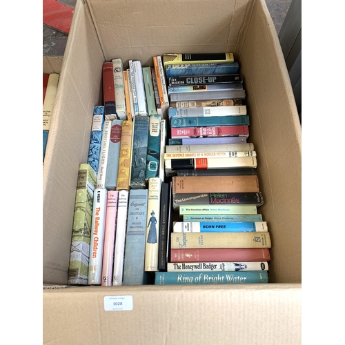 1028 - Three boxes containing books to include authors such as James Herriot, James Milton, Arnold Bennett ... 