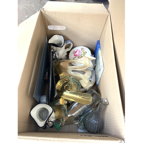 1033 - Three boxes containing glassware, Jasba ceramic jug, studio glass, metalware etc.