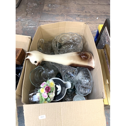 1038 - Three boxes containing lightbulbs, glassware, Coalport ceramics etc.