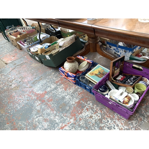 1049 - A collection of house clearance items to include glassware, canteen of cutlery, books etc.