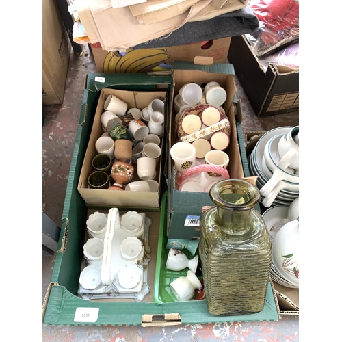 1058 - Four boxes containing Denby ceramics, studio glass etc.