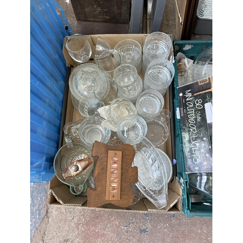 1001 - Two boxes containing glassware to include, Pyrex jugs, wine glasses together with boxed LED lights e... 