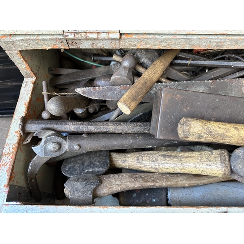 976A - A vintage carpenter's tool chest containing hand tools