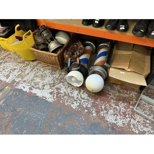 982 - A collection of house clearance items to include vintage oil lanterns, Barber shop poles, record pla... 