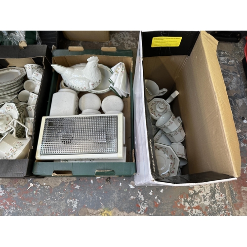 991 - Four boxes containing a large quantity of Johnson Brothers ceramics to include plates, teapots, suga... 