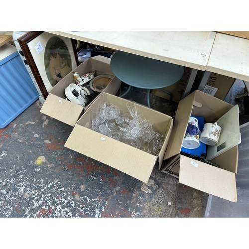 995 - Three boxes containing Dimplex heater, glassware, picture frames etc.