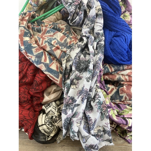 2111 - A large collection of ladies scarves