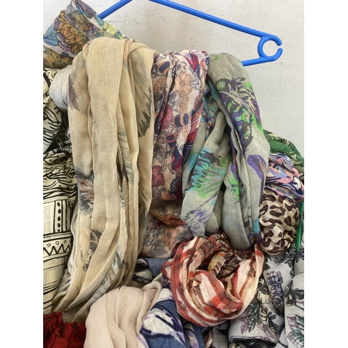 2111 - A large collection of ladies scarves