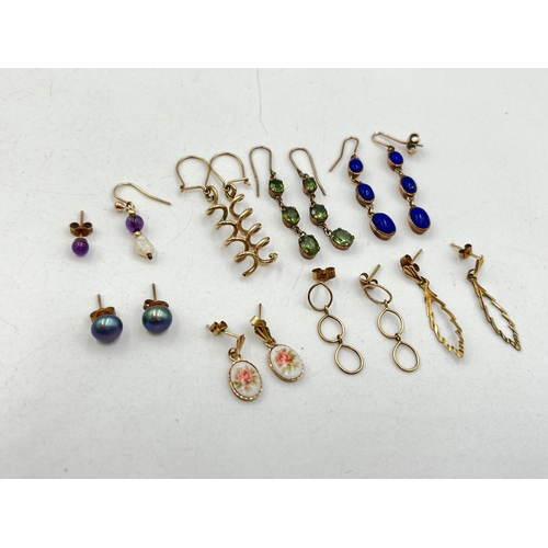 2008 - A collection of 9ct gold and unmarked yellow metal earrings to include lapis lazuli, peridot, amethy... 