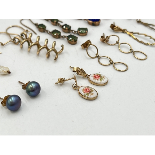 2008 - A collection of 9ct gold and unmarked yellow metal earrings to include lapis lazuli, peridot, amethy... 