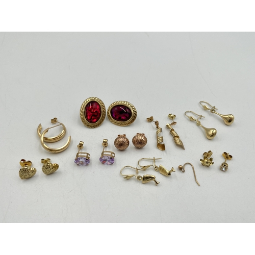 2022 - A collection of 9ct and yellow metal earrings to include 9ct gold pink gemstone earrings, yellow met... 