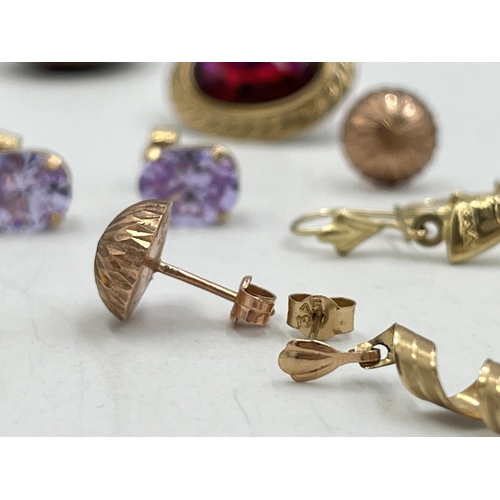 2022 - A collection of 9ct and yellow metal earrings to include 9ct gold pink gemstone earrings, yellow met... 