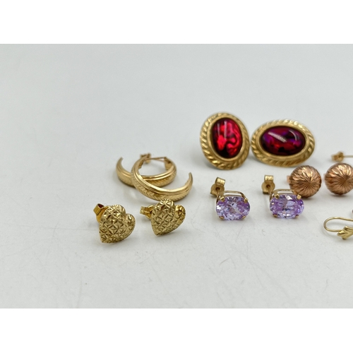 2022 - A collection of 9ct and yellow metal earrings to include 9ct gold pink gemstone earrings, yellow met... 