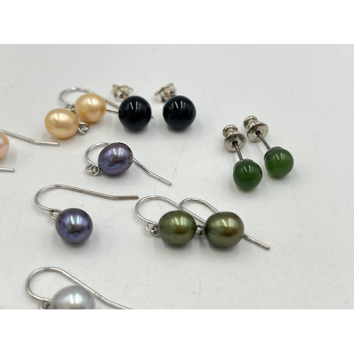 2023 - A collection of .925 silver and white metal gemstone earrings to include tiger's eye, simulated pear... 