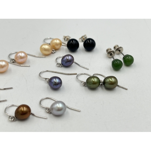 2023 - A collection of .925 silver and white metal gemstone earrings to include tiger's eye, simulated pear... 