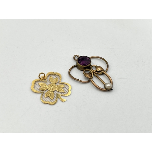 2028 - Two unmarked yellow metal pendants, one Art Nouveau amethyst and seed pearl lavalier and one four le... 