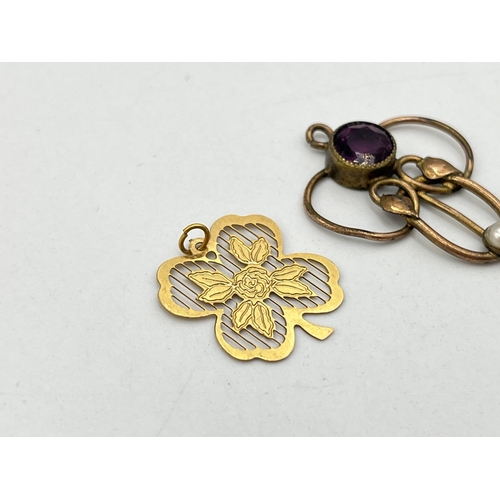 2028 - Two unmarked yellow metal pendants, one Art Nouveau amethyst and seed pearl lavalier and one four le... 