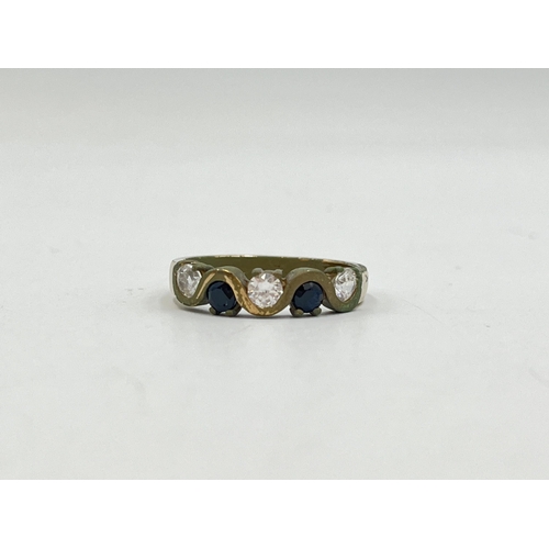 2031 - A 9ct gold sapphire and CZ ring, size P - approx. gross weight 3.6g