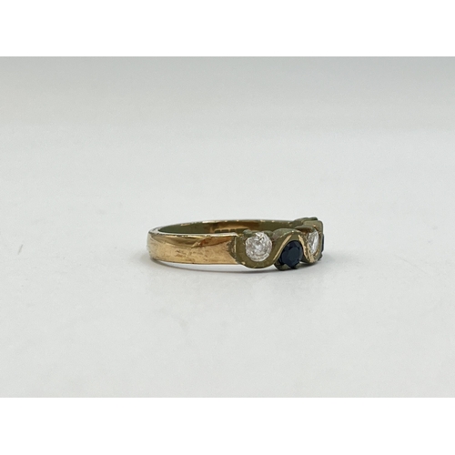 2031 - A 9ct gold sapphire and CZ ring, size P - approx. gross weight 3.6g