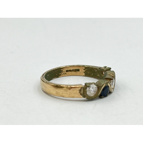 2031 - A 9ct gold sapphire and CZ ring, size P - approx. gross weight 3.6g