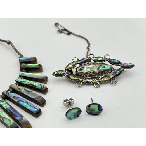 2032 - Four pieces of .925 silver and white metal abalone shell jewellery, two necklaces, one brooch and on... 