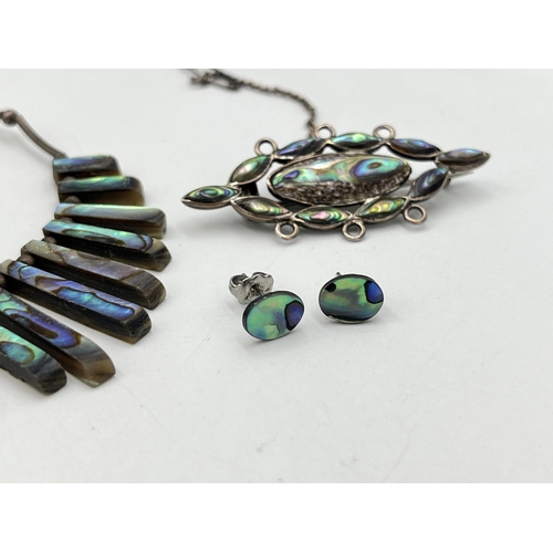 2032 - Four pieces of .925 silver and white metal abalone shell jewellery, two necklaces, one brooch and on... 