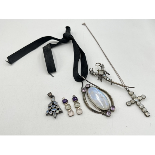 2034 - Five pieces of .925 silver and white metal moonstone jewellery to include white metal cross pendant ... 