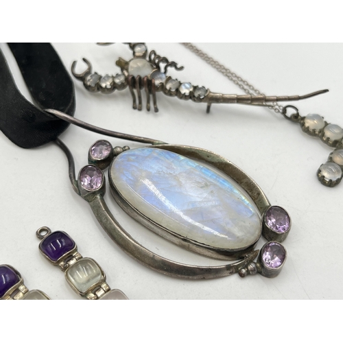 2034 - Five pieces of .925 silver and white metal moonstone jewellery to include white metal cross pendant ... 