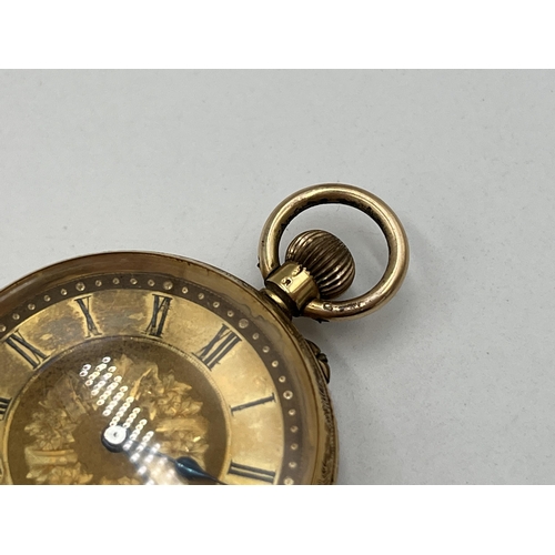 2045 - A Victorian 18ct gold cased hand wind open face lady's pocket watch - approx. gross weight including... 