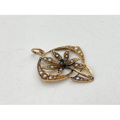 2049 - A late 19th/early 20th century 15ct gold emerald and seed pearl floral lavalier pendant - approx. gr... 