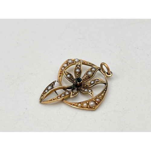 2049 - A late 19th/early 20th century 15ct gold emerald and seed pearl floral lavalier pendant - approx. gr... 