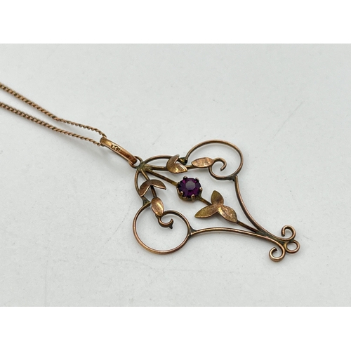 2050 - An Art Nouveau 9ct gold amethyst floral lavalier pendant necklace - approx. gross weight 3g