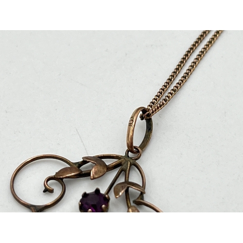 2050 - An Art Nouveau 9ct gold amethyst floral lavalier pendant necklace - approx. gross weight 3g