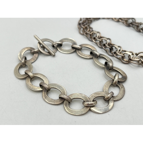 2053 - Two hallmarked sterling silver bracelets, one hallmarked London with heart shaped padlock clasp, dat... 